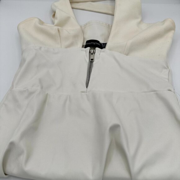 PrettyLittleThing Cream PU Zip Detail Cross Bodycon Dress - Picture 2 of 5